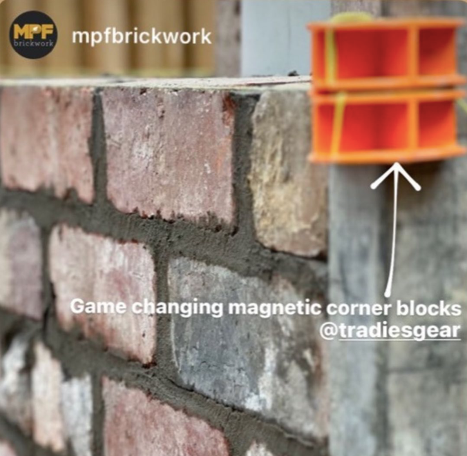 Close-up customer view of Tradies Gear MAGSY magnetic line block secured to a steel post for precise bricklaying