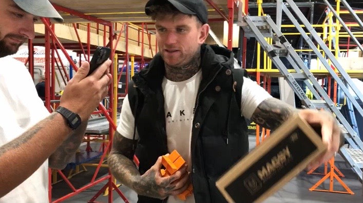 Supertrowel winner Charlie Collison getting his hands on a pair of MAGSY'S on game day