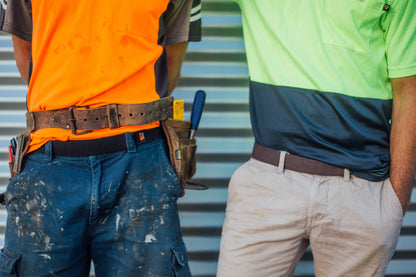 Tradies showing reversible colours lack adn brown. Velcro fasten belt under leather tool  belt.
